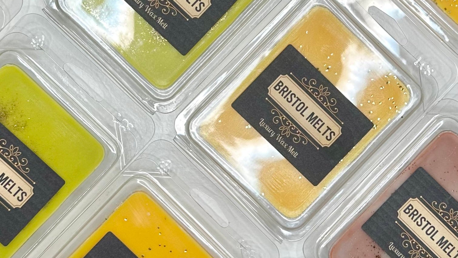 Grid of Bristol Melts wax melts in various colors with visible branding.